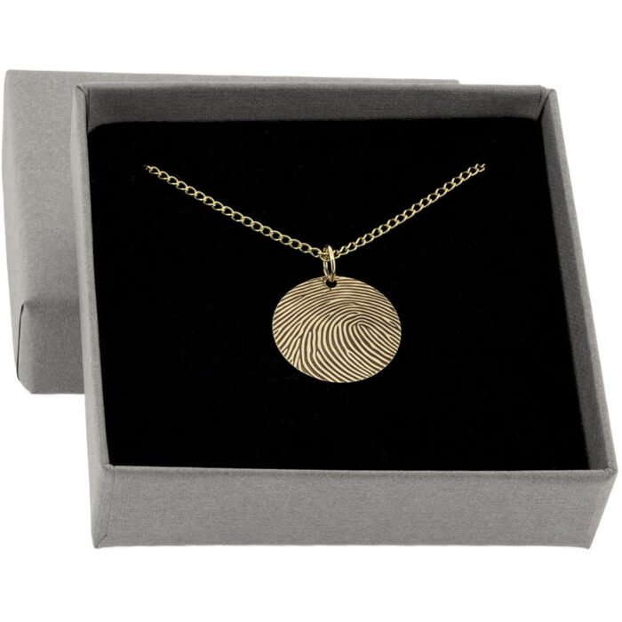 gold fingerprint disc pendant in Laalie jewellery box