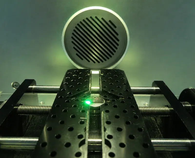 Fingerprint being laser engraved onto a silver pendant at Laalie