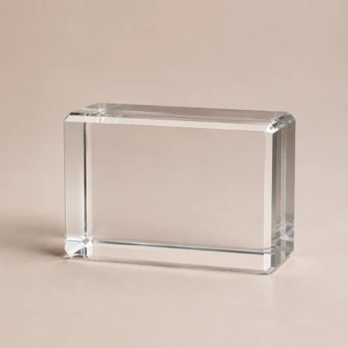 Small clear rectangular crystal block C0003 displayed in landscape orientation