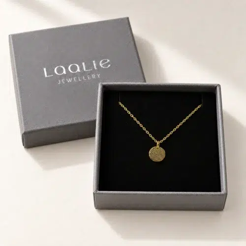 9mm gold coloured stainless steel fingerprint disc necklace in an open grey Laalie gift box