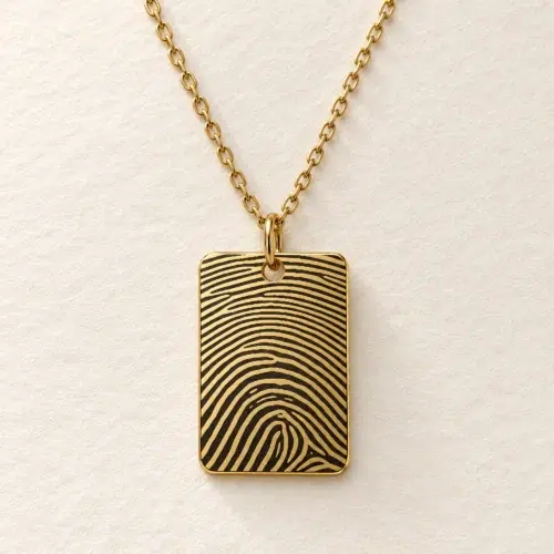 15 × 22mm gold coloured stainless steel rectangular pendant with fingerprint engraving on an ivory background