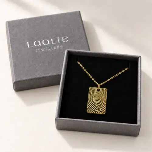 15 × 22mm gold coloured stainless steel fingerprint rectangle necklace in an open grey Laalie gift box