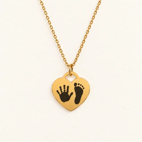 15mm gold coloured stainless steel heart necklace with a handprint and a footprint.