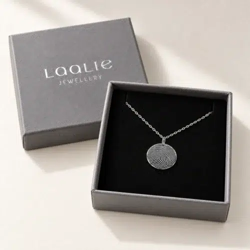 15mm silver coloured stainless steel fingerprint disc necklace in an open grey Laalie gift box