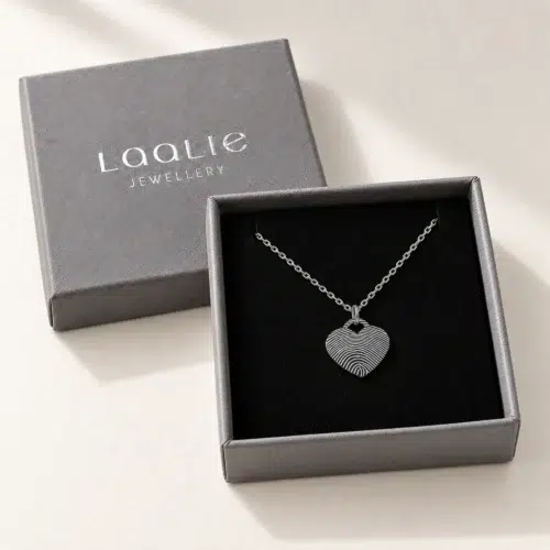 15mm silver coloured stainless steel fingerprint heart necklace in an open grey Laalie gift box
